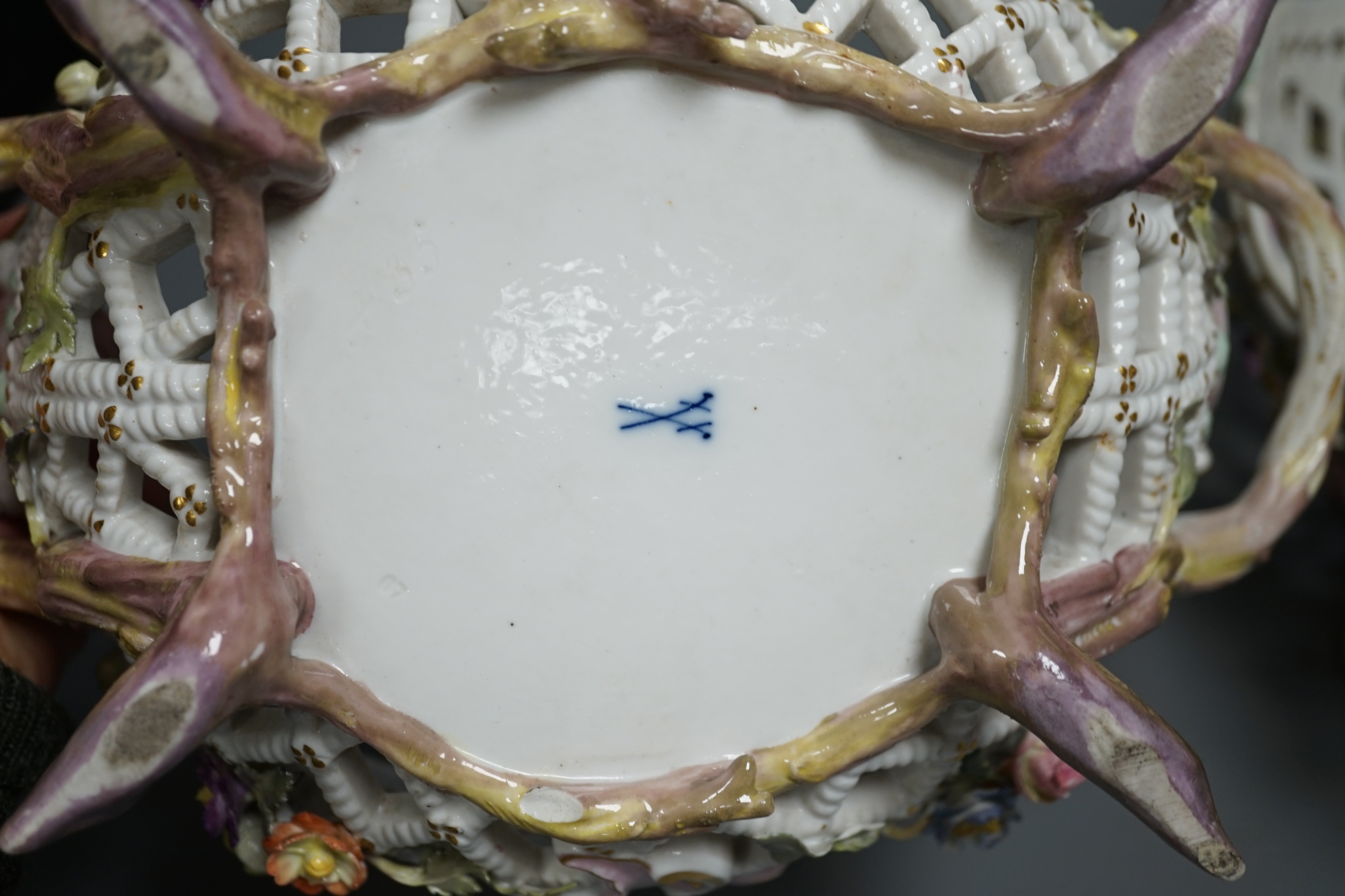 Two similar late 19th century Meissen floral encrusted pierced porcelain bowls 27cm